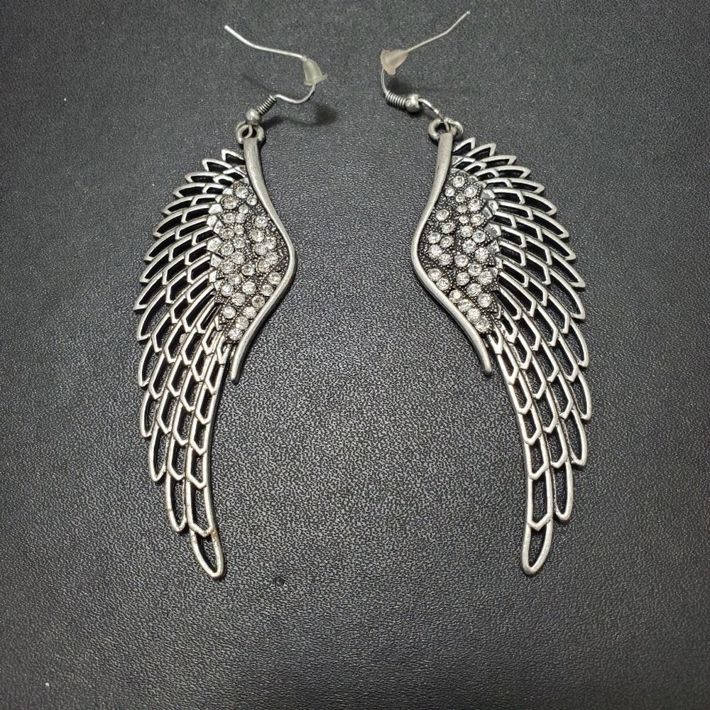 Silver tone angel wing earrings